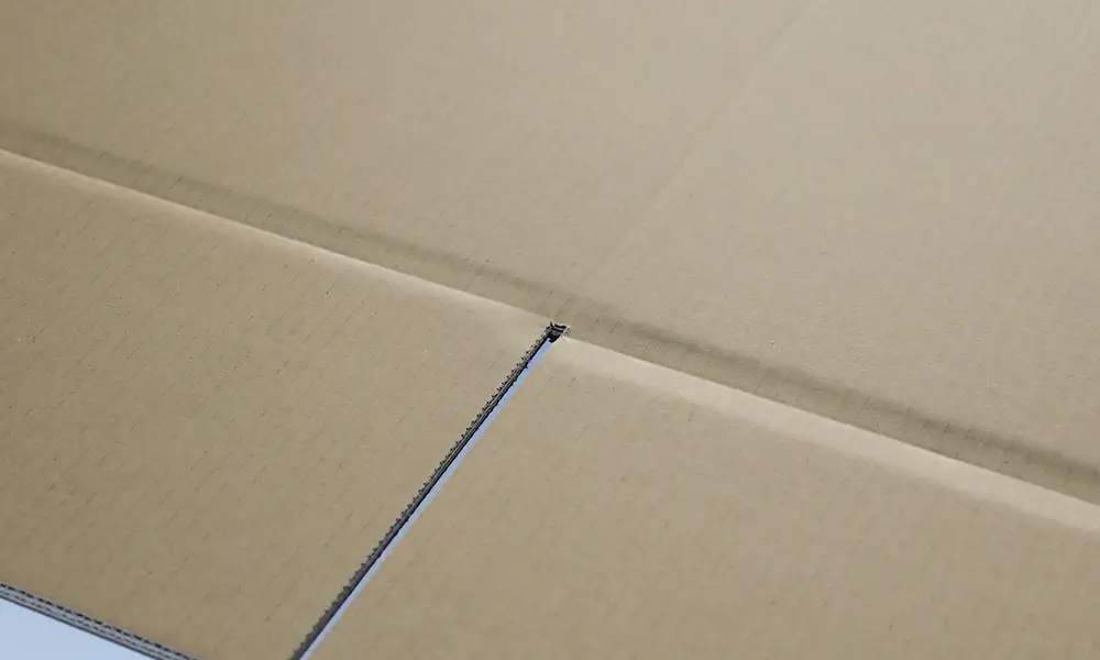 Offset Creasing for Corrugated Cardboards